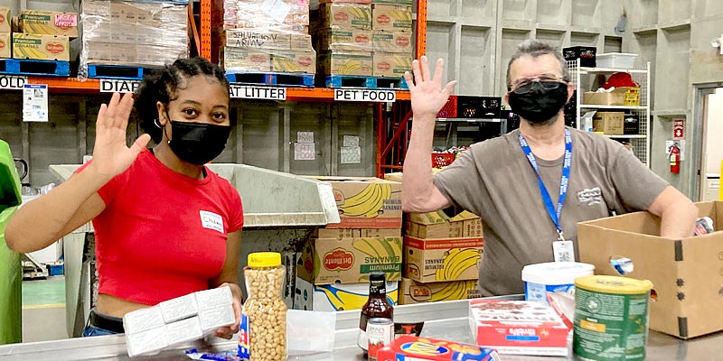 Volunteers Andy and Chidera