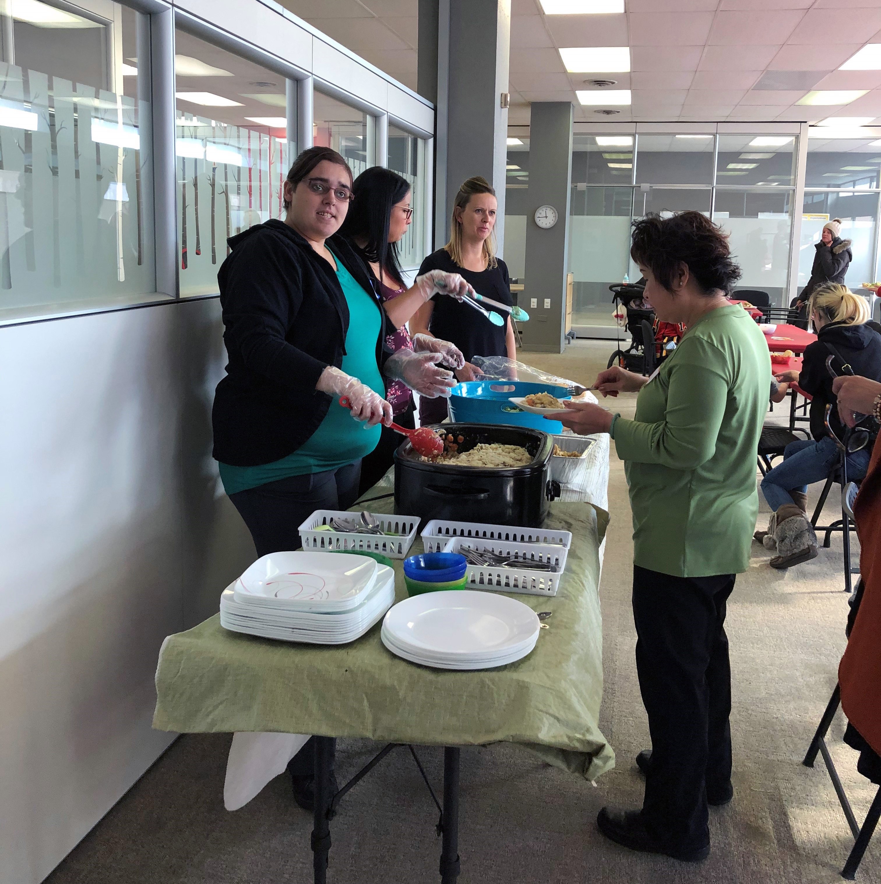 Connections volunteers servicing food